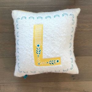L initial Anthropologie pillow